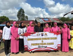 Polwan Ditreskrimsus Polda Kaltim Bersama Bhayangkari Salurkan Bantuan Sosial di Kampung Bedeng Balikpapan