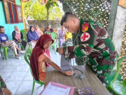 Satgas Pamtas RI–Malaysia Yonarmed 19/Bogani Gelar Pengobatan Gratis bagi Masyarakat Desa Tombolango