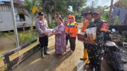 Polsek Muara Wahau Salurkan Bantuan Logistik untuk Warga Desa Nehas Liah Bing Terdampak Banjir
