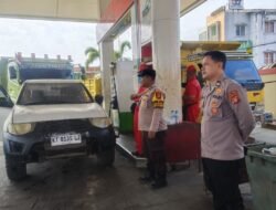 SPBU Depan STC Sangatta Dijaga Polisi, Pengisian BBM Diawasi Ketat